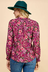 V-necked Ruffled Floral Printed Top with Smocked Sleeves.