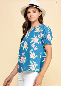 Blue floral top with smocked sleeves