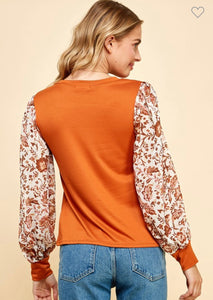 Rust floral sleeves